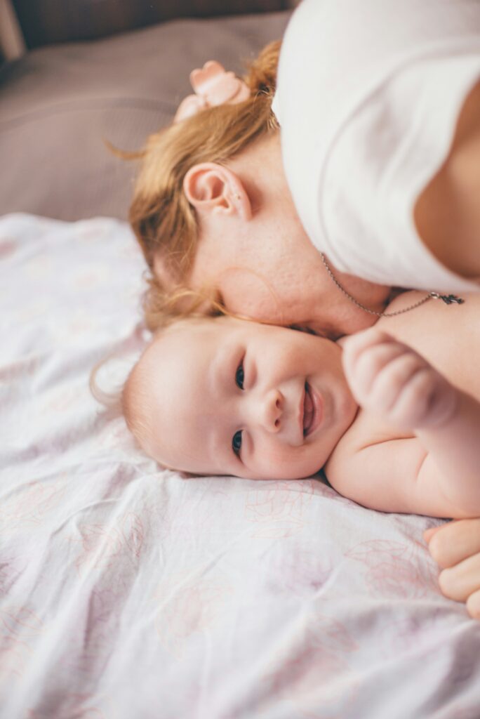 Child being kissed by mother